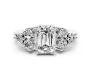 Emerald Cut Diamond Solitaire Ring Set in Silver with Cluster Accents on Each Side