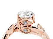 Oval Cut Diamond Solitaire Twist Engagement Ring Set in Rose gold with Pavé Leaf Accents