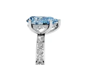 Fancy Blue Pear Cut Diamond Pavé Band Ring Set in Platinum with Prong-Set Center Stone