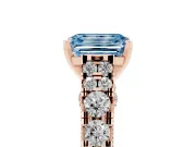 Fancy Blue Emerald Cut Diamond Classic Solitaire Ring Set in Rose gold with Pavé Band and Prong Setting