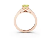 Fancy Yellow Oval Cut Diamond Solitaire Ring Set in Rose gold with Channel-Set Band and Prong Setting