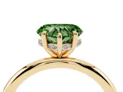 Fancy Green Heart Cut Diamond Solitaire Ring Set in Yellow gold with Thin Band and Prong Setting