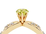 Fancy Yellow Pear Cut Diamond Solitaire Ring Set in Yellow gold with Side Stones on Criss-Cross Band and Prong Setting
