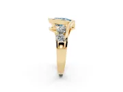Fancy Blue Pear Cut Diamond Bezel Bypass Ring Set in Yellow gold with Round Accents