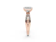 Emerald Cut Diamond Three-Stone Ring Set in Rose gold with Pavé Split Shank and Prong Setting