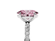 Fancy Pink Oval Cut Diamond Solitaire Ring Set in Platinum with Round Pavé Band and Prong Setting