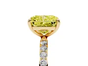 Fancy Yellow Radiant Cut Diamond Solitaire Ring Set in Yellow gold with Round Pavé Band and Prong Setting