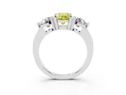 Fancy Yellow Oval Cut Diamond Three-Stone Ring Set in Platinum with Prong Setting and Classic Band