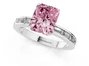 Fancy Pink Radiant Cut Diamond Solitaire Ring Set in Platinum with Channel-Set Baguette Band and Prong Setting