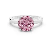 Fancy Pink Round Cut Diamond Solitaire Ring Set in Platinum with Prong Head and Smooth Polished Band