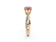 Fancy Pink Round Cut Diamond Twist Band Solitaire Set in Yellow gold with Pavé Accents and Prong Setting