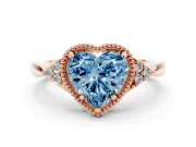 Fancy Blue Heart Cut Diamond Milgrain Solitaire Ring Set in Rose gold with Tapered Pavé Band and Prong Setting