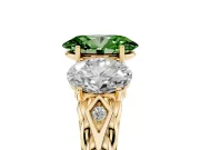 Fancy Green Oval Cut Diamond Three-Stone Ring Set in Yellow gold with Braided Band