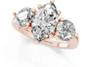 Marquise Cut Diamond Three-Stone Ring Set in Rose gold with Prong Setting and Classic Band