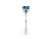 Fancy Blue Asscher Cut Diamond Solitaire Ring Set in Silver with Prong Setting on a Plain Round Band
