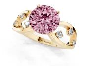 Fancy Pink Round Cut Diamond Solitaire Ring Set in Yellow gold with Side Stones on Criss-Cross Band and Prong Setting