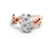 Oval Cut Diamond Solitaire Twist Engagement Ring Set in Rose gold with Pavé Leaf Accents