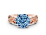 Fancy Blue Round Cut Diamond Milgrain Leaf Band Solitaire Ring Set in Rose gold with Accent Stones and Prong Setting