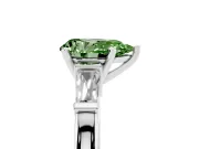 Fancy Green Pear Cut Diamond Solitaire Ring Set in White gold with Tapered Baguette Accents and Prong Setting