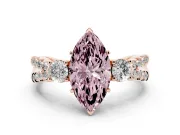 Fancy Pink Marquise Cut Diamond Three-Stone Ring Set in Rose gold with Pavé Split Shank and Prong Setting