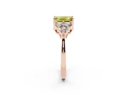 Fancy Yellow Emerald Cut Diamond Solitaire Ring Set in Rose gold with Cluster Accents on Each Side