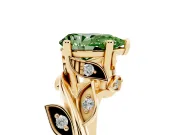 Fancy Green Pear Cut Diamond Solitaire Twist Engagement Ring Set in Yellow gold with Pavé Leaf Accents