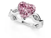 Fancy Pink Heart Cut Diamond Twist Band Solitaire Ring Set in Platinum with Leaf Prong Setting and Accent Stones