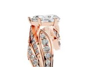 Pear Cut Diamond Solitaire Ring Set in Rose gold with Layered Twist Pavé Band