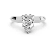 Pear Cut Diamond Solitaire Engagement Ring Set in Platinum with Flat Band and Prong Setting