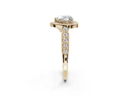Heart-Shaped Lab-Grown Diamond Milgrain Halo Solitaire Ring Set in Yellow Gold with Bezel Set Side Stones and Pavé Band