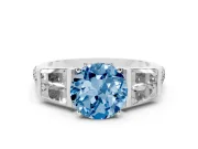 Fancy Blue Round Cut Diamond Engagement Ring Set in White gold with Baguette Side Stones and Channel Set Band