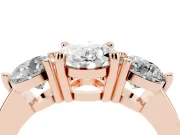 Oval Cut Diamond Three-Stone Ring Set in Rose gold with Prong Setting and Classic Band