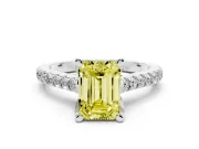 Fancy Yellow Emerald Cut Diamond Solitaire Ring Set in Platinum with Brilliant Pavé Band and Prong Setting