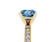 Fancy Blue Princess Cut Diamond Solitaire Ring Set in Yellow gold with Slim Pavé Band and Prong Setting