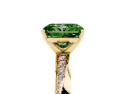 Fancy Green Radiant Cut Diamond Engagement Ring Set in Yellow gold with Side Stone Accents and Prong Setting