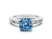 Fancy Blue Cushion Cut Diamond Solitaire Ring Set in Silver with Channel-Set Baguette Band and Prong Setting