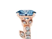 Fancy Blue Oval Cut Diamond Solitaire Leaf-Inspired Ring Set in Rose gold with Pavé Band and Prong Setting