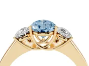 Fancy Blue Three-Stone Pear Cut Diamond Ring Set in Yellow gold with Matching Prong Settings and Plain Band
