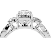 Emerald Cut Diamond Three-Stone Ring Set in White gold with Pavé Split Shank and Prong Setting
