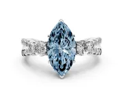Fancy Blue Marquise Cut Diamond Three-Stone Ring Set in Platinum with Pavé Split Shank and Prong Setting