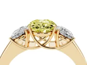Fancy Yellow Three-Stone Oval Cut Diamond Ring Set in Yellow gold with Matching Prong Settings and Plain Band