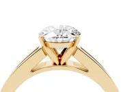 Oval Cut Diamond Solitaire Ring Set in Yellow gold with Channel-Set Band and Prong Setting
