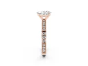 Oval Cut Diamond Solitaire Ring Set in Rose gold with Slim Pavé Band and Prong Setting
