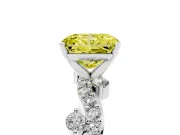 Fancy Yellow Radiant Cut Diamond Solitaire Twisted Band Set in White gold with Pavé Setting