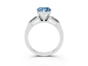 Fancy Blue Heart Cut Diamond Solitaire Ring Set in Silver with Tapered Baguette Side Stones and Prong Setting