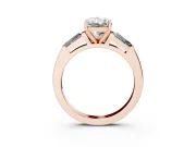 Radiant Cut Diamond Solitaire Ring Set in Rose gold with Tapered Baguette Side Stones and Prong Setting