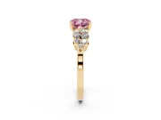 Fancy Pink Cushion Cut Diamond Cluster Engagement Ring Set in Yellow gold with Pavé Band and Prong Setting