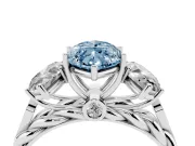 Fancy Blue Marquise Cut Diamond Three-Stone Ring Set in White gold with Braided Band