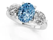 Fancy Blue Oval Cut Diamond Three-Stone Ring Set in Silver with Prong Setting and Classic Band