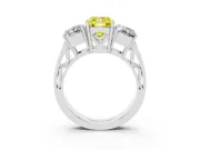 Fancy Yellow Cushion Cut Diamond Three-Stone Ring Set in Platinum with Textured Band
